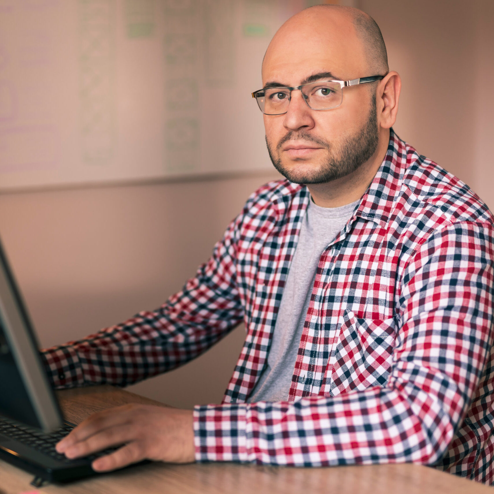 graphic designer working on new app development 2021 12 09 09 36 40 utc scaled e1771519896966